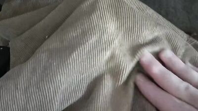 Close-up video of chap stroking his prick with a condom on