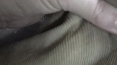 Close-up video of chap stroking his prick with a condom on