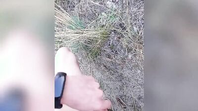 Amateur gay dude is stretching his big dick out in the open