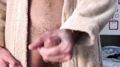Perverted stepdad is stroking his dong after the hot shower