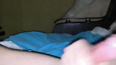 Close-up footage of a dude stroking his huge cock