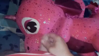 Naughty amateur chap is rubbing his pecker on a cute pinky dinosaur