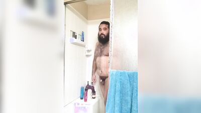 Amateur bear is filming himself while taking a hot shower