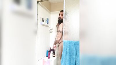 Amateur bear is filming himself while taking a hot shower