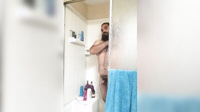 Amateur bear is filming himself while taking a hot shower