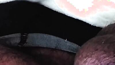 Close-up footage of a chap playing with his pecker