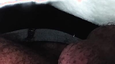 Close-up footage of a chap playing with his pecker