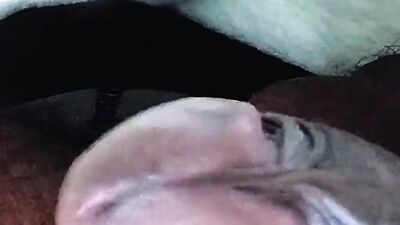 Close-up footage of a chap playing with his pecker