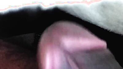 Close-up footage of a chap playing with his pecker
