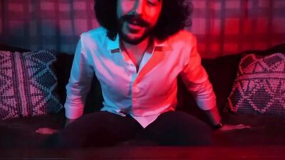 Longhaired mustache chap is jerking off in front of the cam