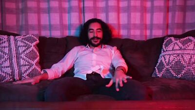 Longhaired mustache chap is jerking off in front of the cam