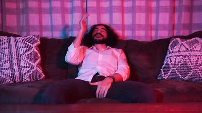 Longhaired mustache chap is jerking off in front of the cam