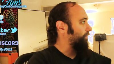 Amateur bearded bloke is talking with a fan in this solo video
