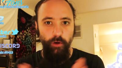 Amateur bearded bloke is talking with a fan in this solo video