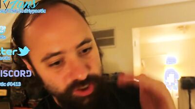 Amateur bearded bloke is talking with a fan in this solo video