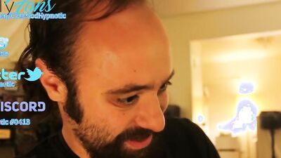 Amateur bearded bloke is talking with a fan in this solo video