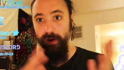 Amateur bearded bloke is talking with a fan in this solo video