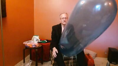 Amateur perverted stepdad is playing with a huge blue balloon