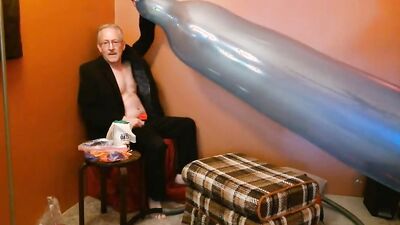 Amateur perverted stepdad is playing with a huge blue balloon