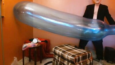 Amateur perverted stepdad is playing with a huge blue balloon
