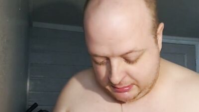 Perverted fatty is swallowing huge dildo in front of the camera