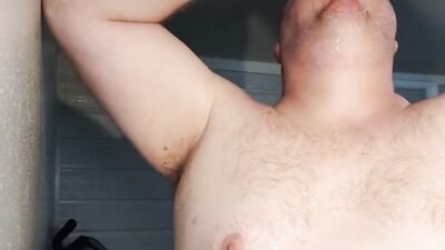 Cock hungry bloke is filling his slimy mouth with a huge dildo