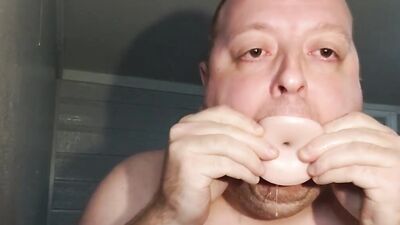 Pervertes chubby fellow is wrapping his slimy motu around huge dildo