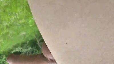 Amateur bloke is playing with his toy out in the open