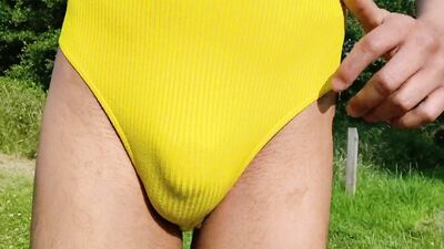 Round ass sissy is flashing his cheeks out in the open