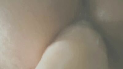 Round ass European fella is rising a dildo in front of the cam