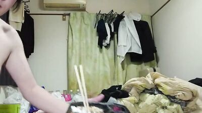 Amateur Japanese fellow is eating some food in front of the cam