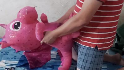 Perverted fellow is rubbing his pecker on a pinky dragon toy