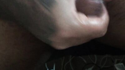Amateur bloke is stroking his tiny black prick in this close-up video