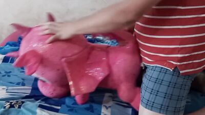 Guy rubs his hard pecker on a pinky dragon toy