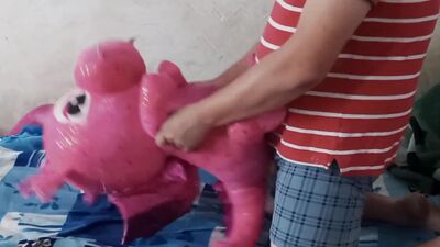 Pervertes bloke is rubbing his hard pecker on a pinky dinosaur