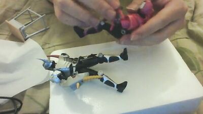 Amateur Japanese bloke is playing with his toys in front of the cam