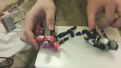 Amateur Japanese bloke is playing with his toys in front of the cam