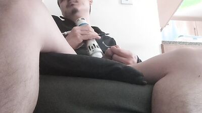 Perverted Asian chap is teasing his pecker with an electrical toy