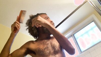 Hairy Rock Mercury is taking a shower in front of the camera