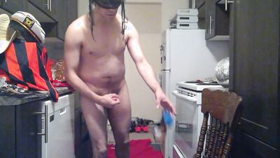Perverted amateur bloke is playing with a cock in the kitchen