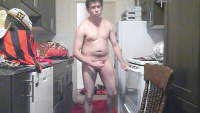 Perverted amateur bloke is playing with a cock in the kitchen