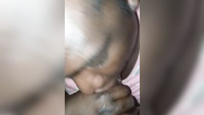 African chap is sucking his mate's BBC in this close-up footage