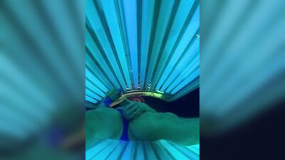 Horny bloke is jerking his cock inside the tanning salon