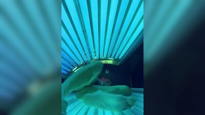 Horny bloke is jerking his cock inside the tanning salon