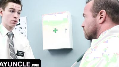 Cute twink gets his hard prick stroked by perverted doctor