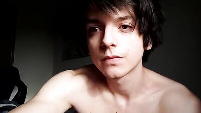 Good looking teen jerks his prick in front of the cam