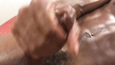 Perverted African bloke jerks his BBC in front of the camera