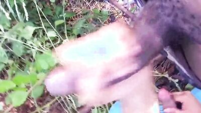 Horny African lad strokes his BBC deep inside the forest