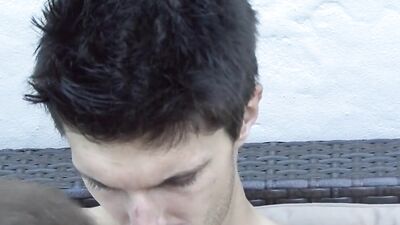 Cute European bloke is sucking his bud's cock out in the open