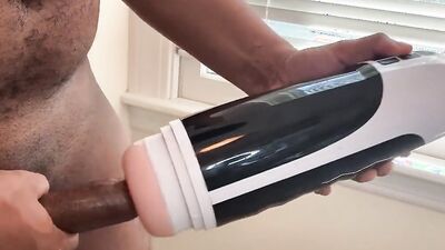 Close-up video of a chap stroking his prick with a toy